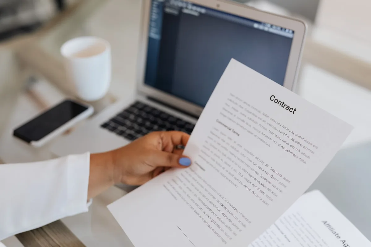 investor reviewing legal contract papers