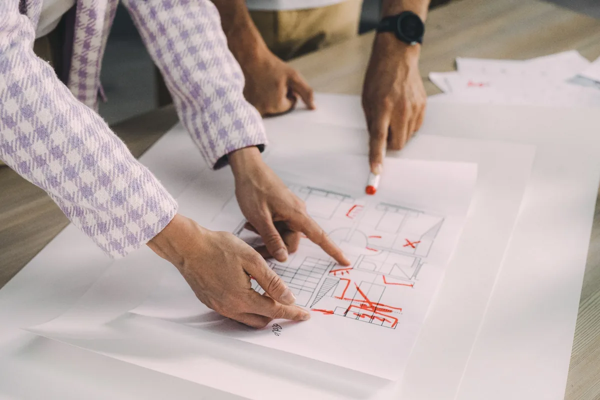 architect blueprint presentation table meeting