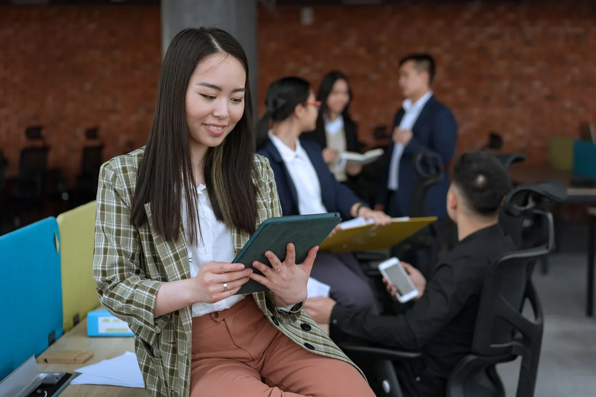 hotel employee learning on tablet mobile device