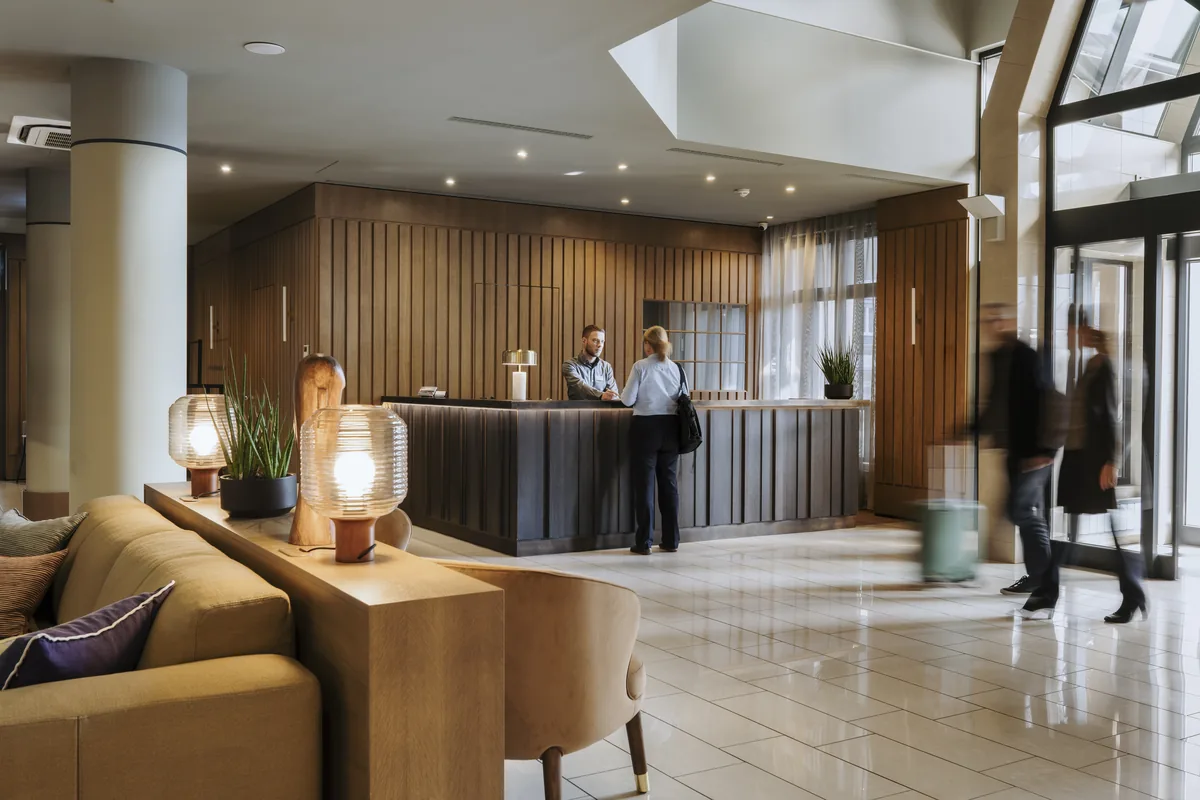 Reception and lobby at Adina Apartment Hotel Budapest