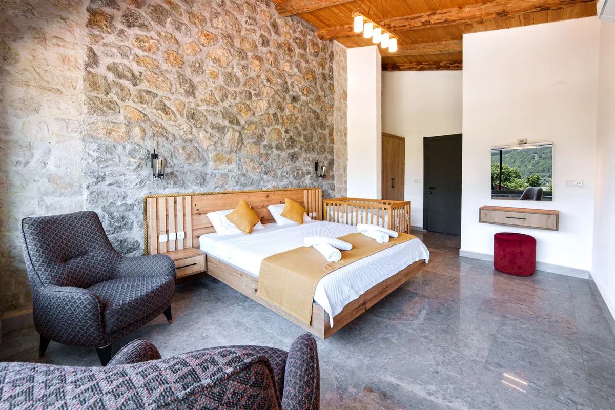 hotel bedroom interior stone walls