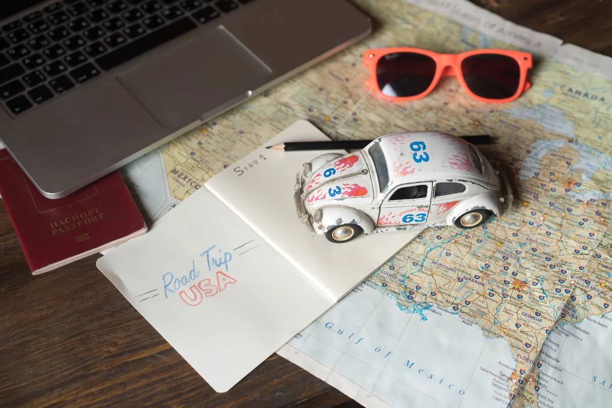 corporate office desk with travel itinerary