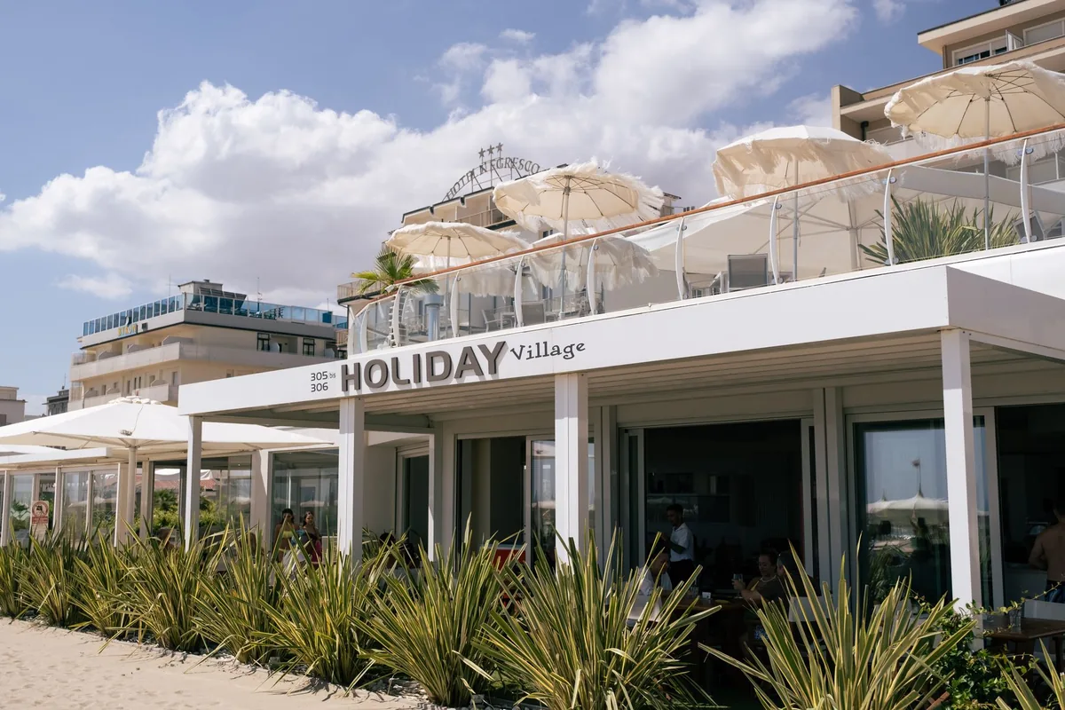 family dining outdoor hotel terrace seaside