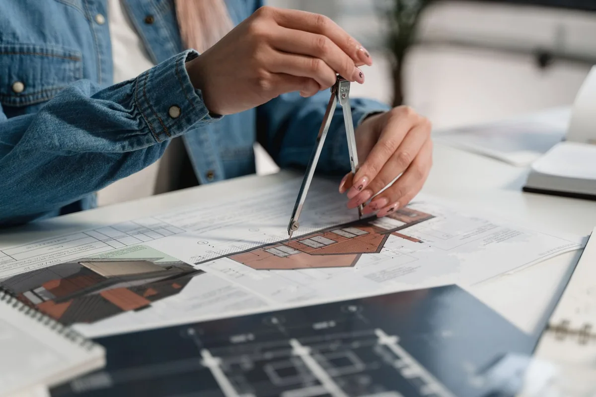 architectural blueprints on developer desk