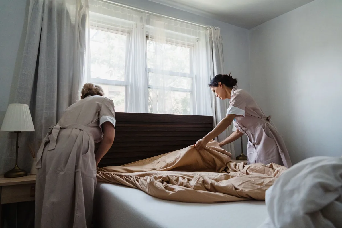 hotel housekeeping cleaning bedroom