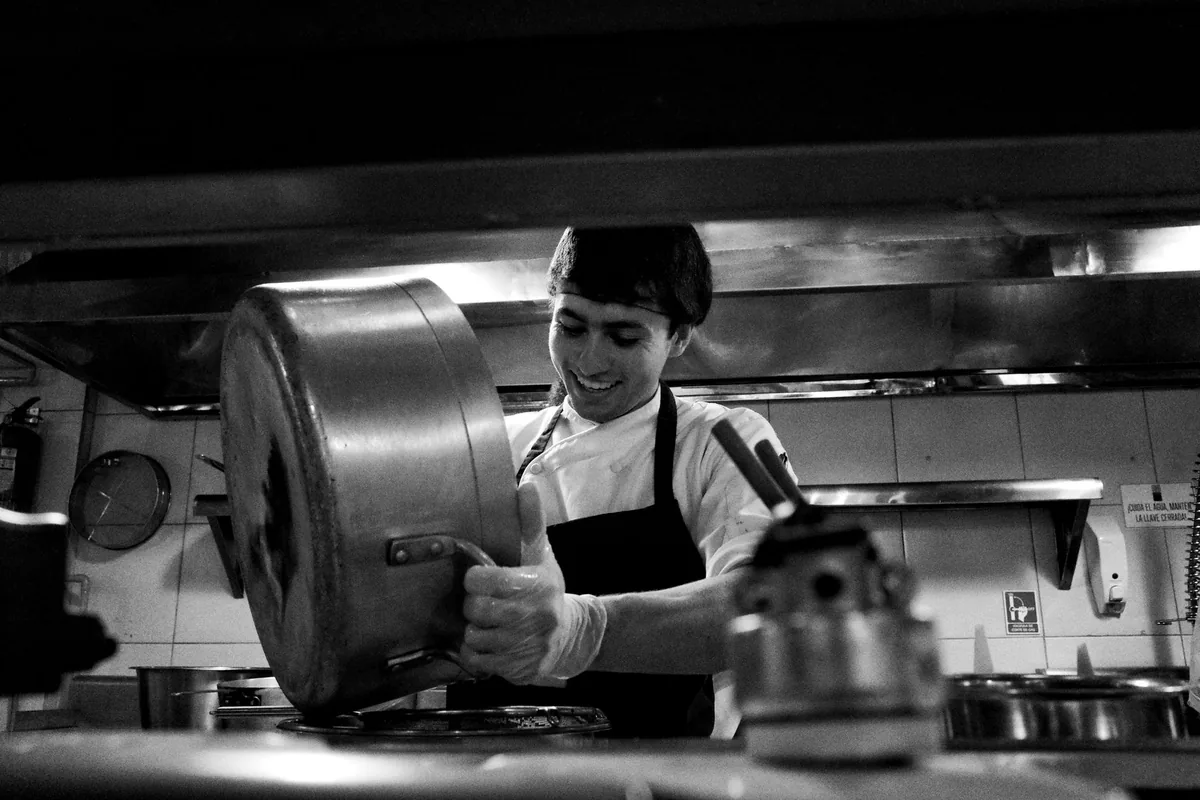 commercial hotel kitchen staff cooking
