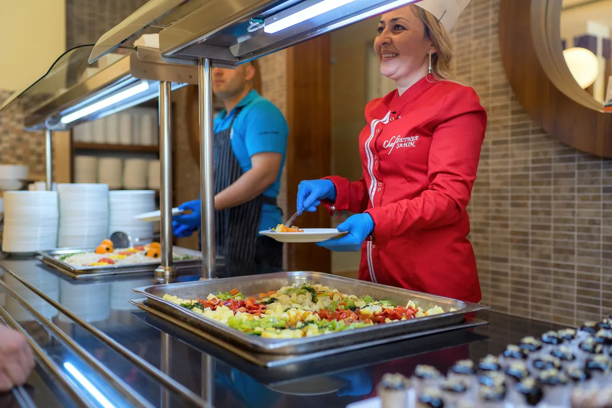 hotel restaurant staff serving food