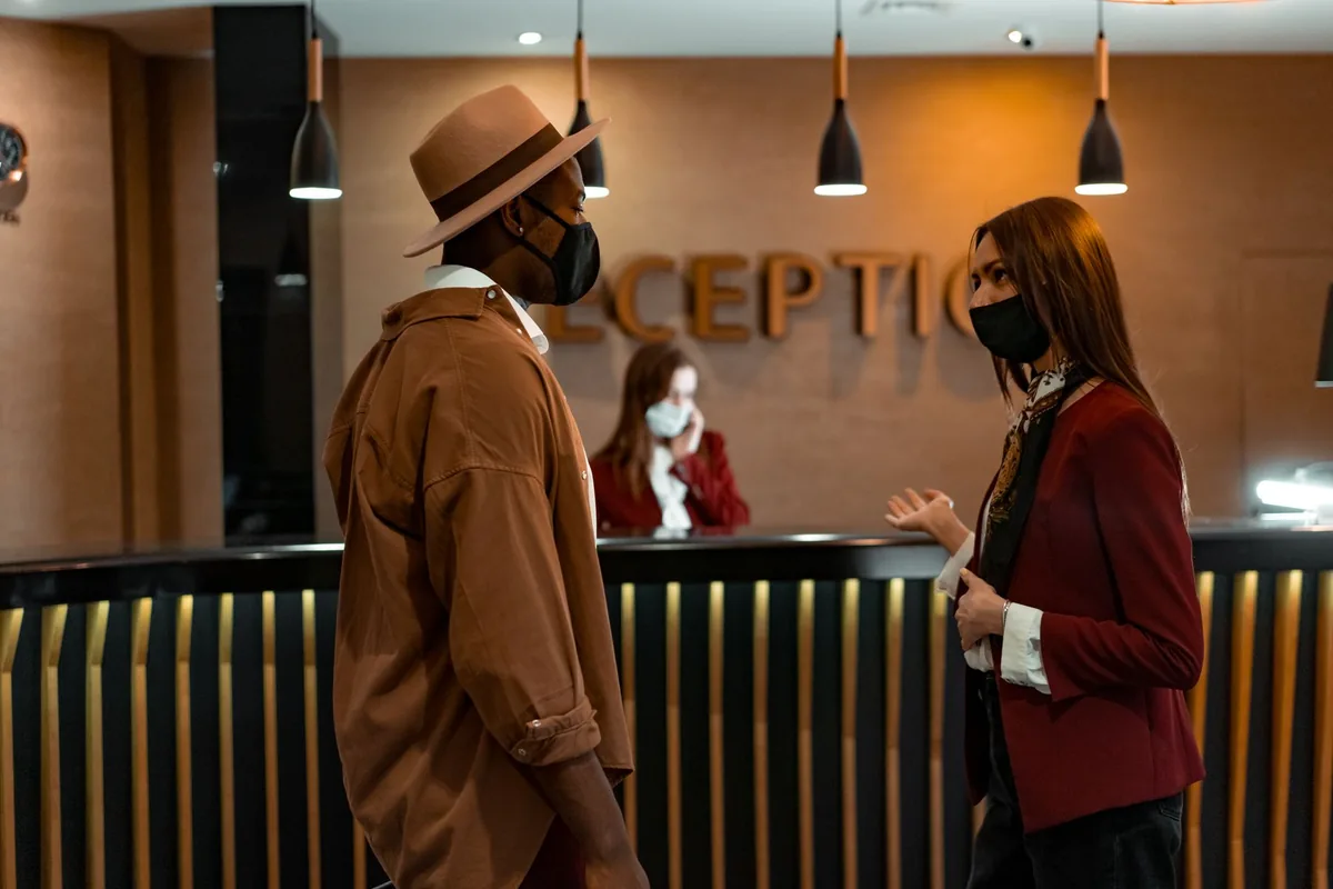 hotel front desk check-in staff
