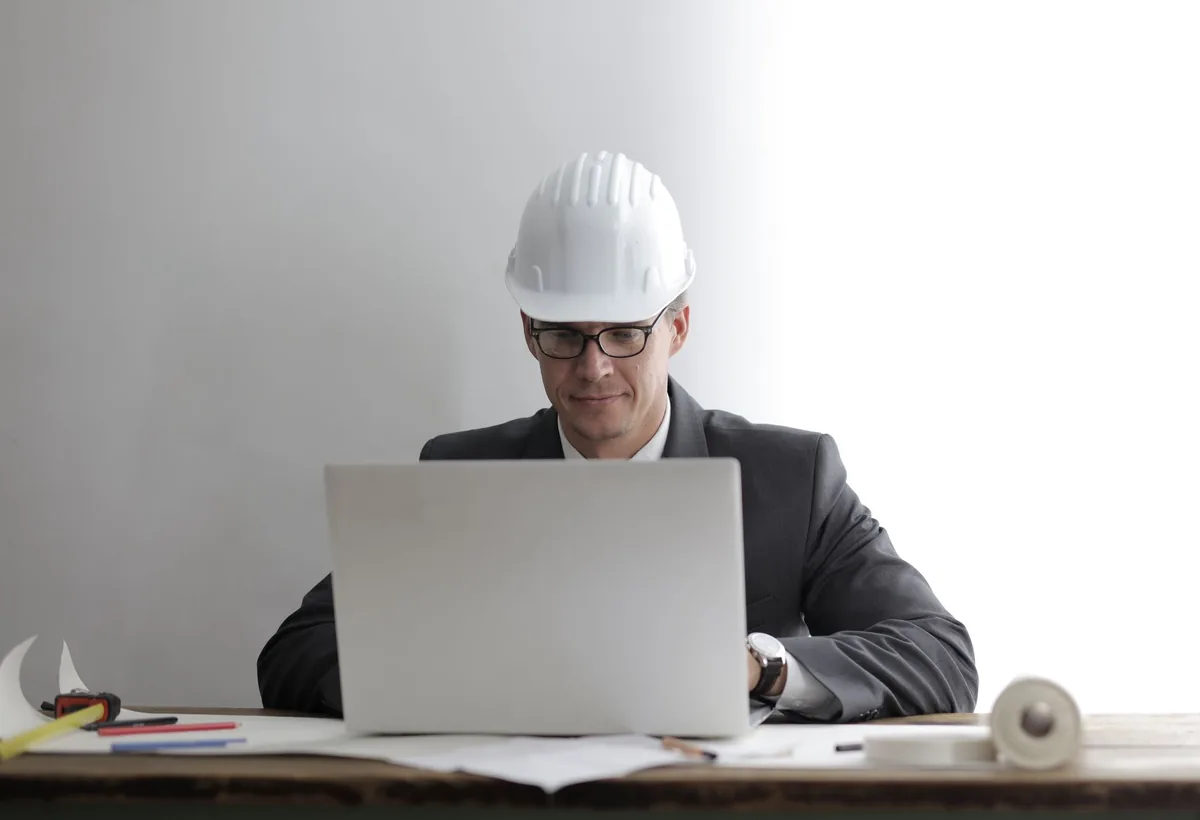 hotel manager working on laptop computer