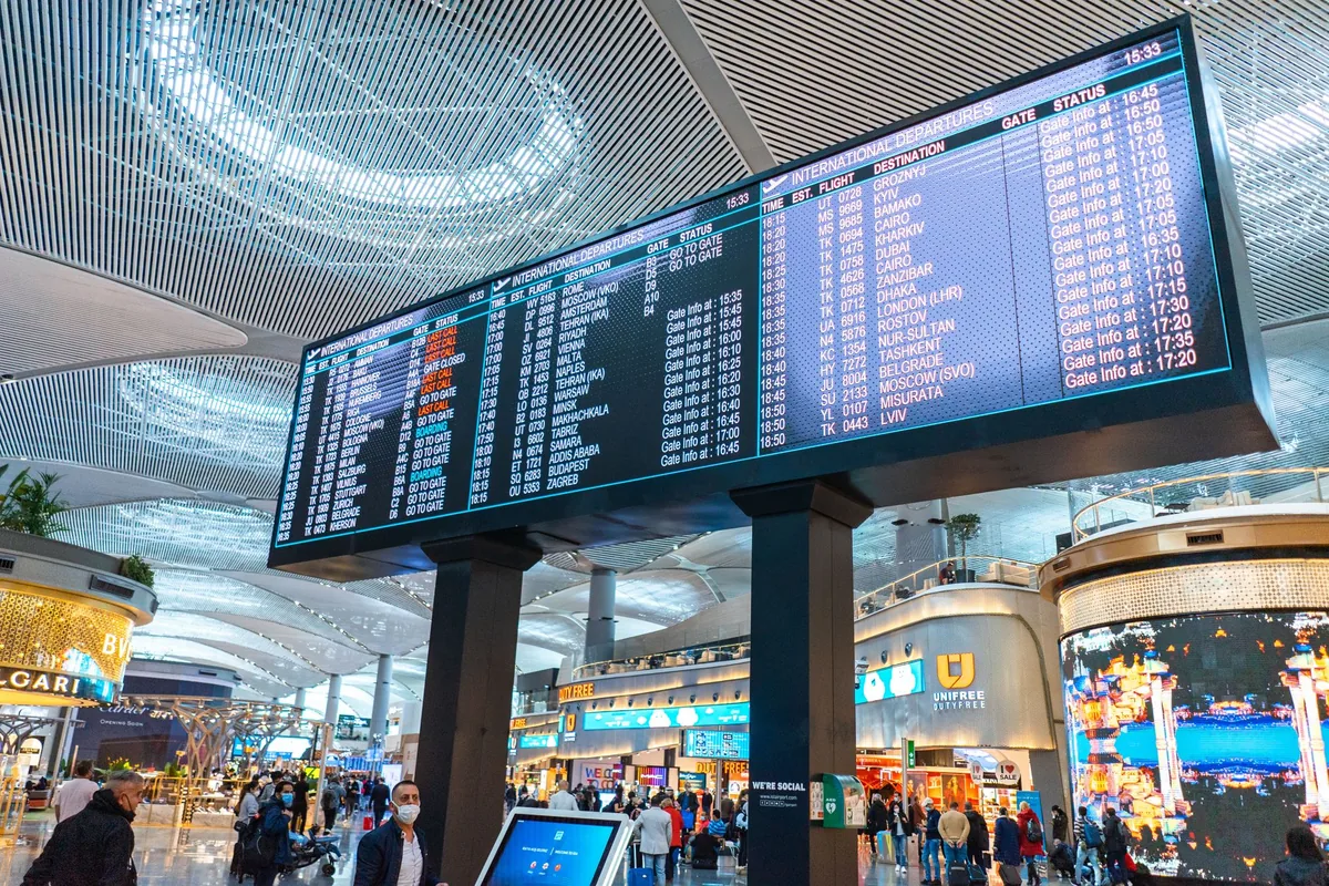 commercial airport terminal departures board