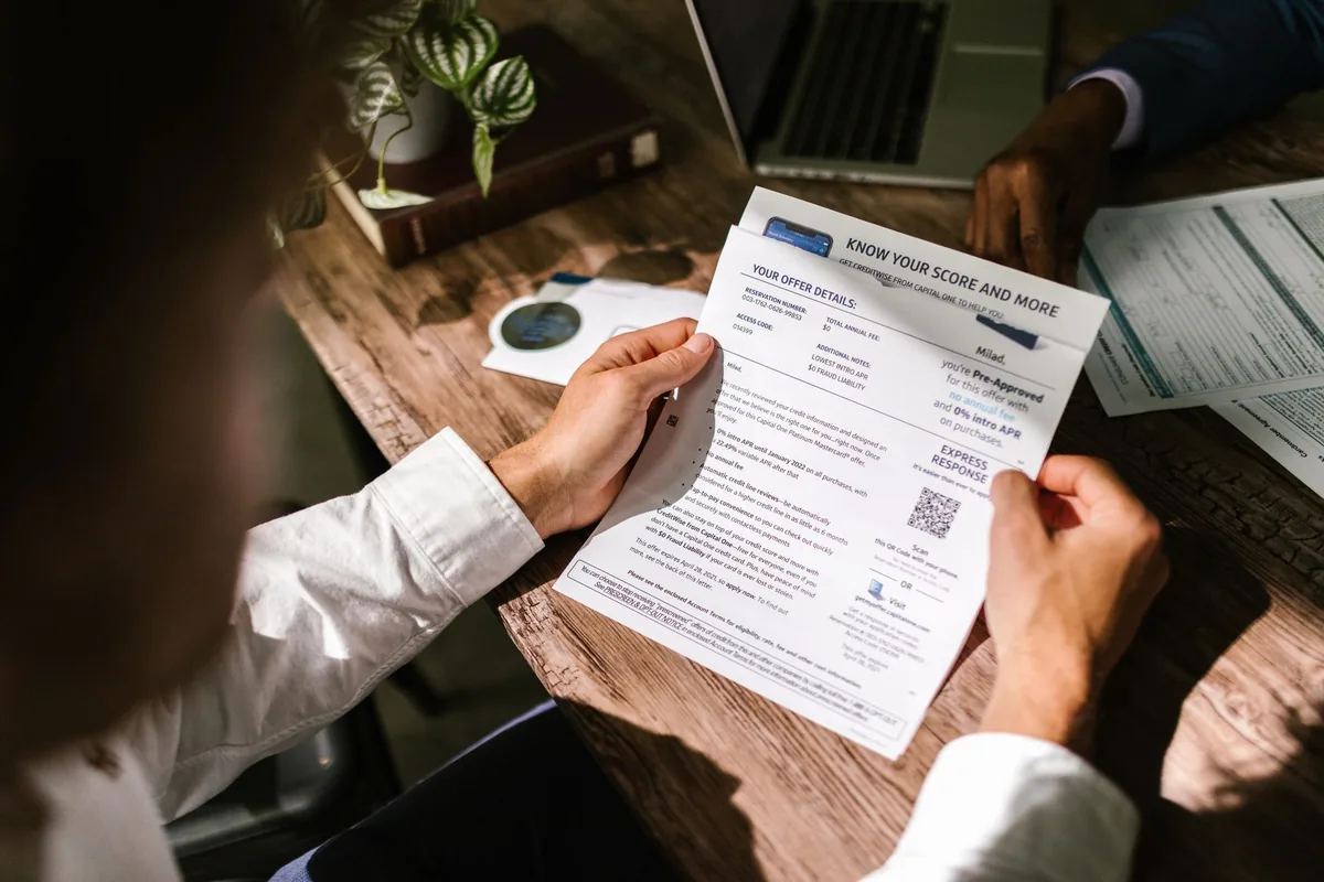 commercial bank lending officer reviewing financial documents