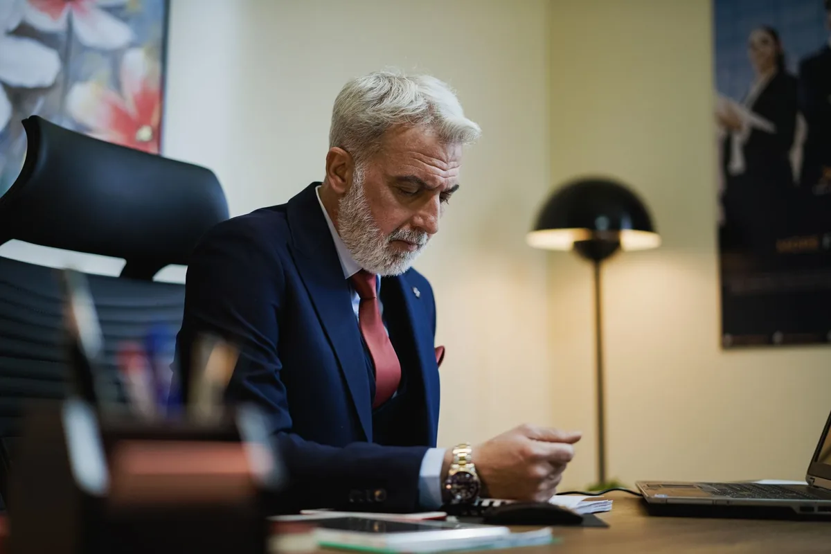 hotel manager working laptop