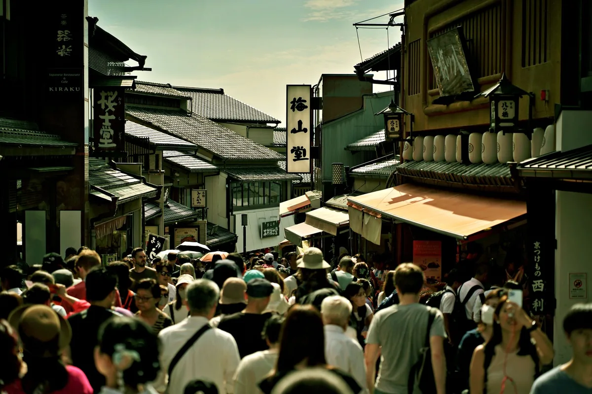 crowded historic kyoto street tourists