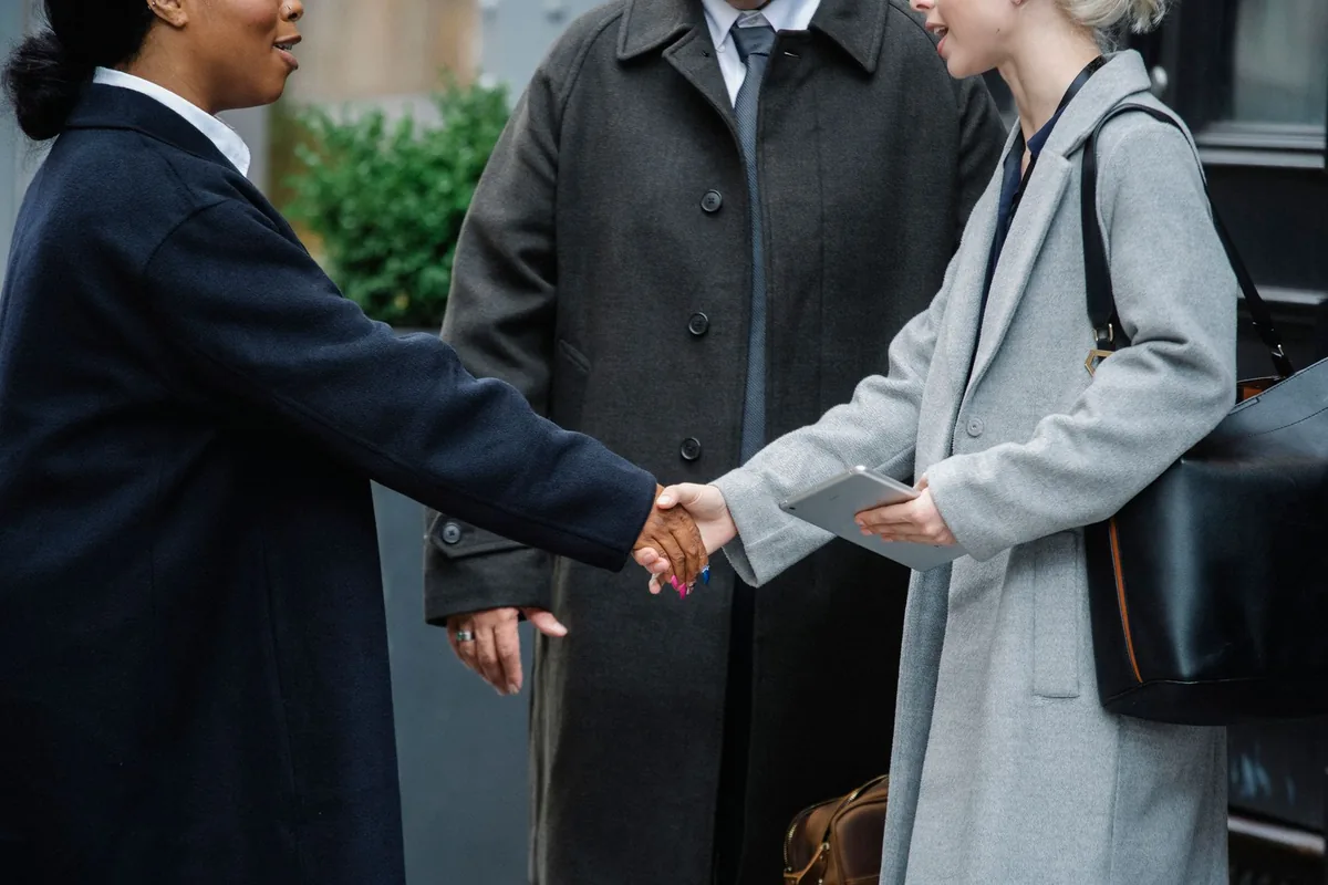 corporate handshake agreement meeting