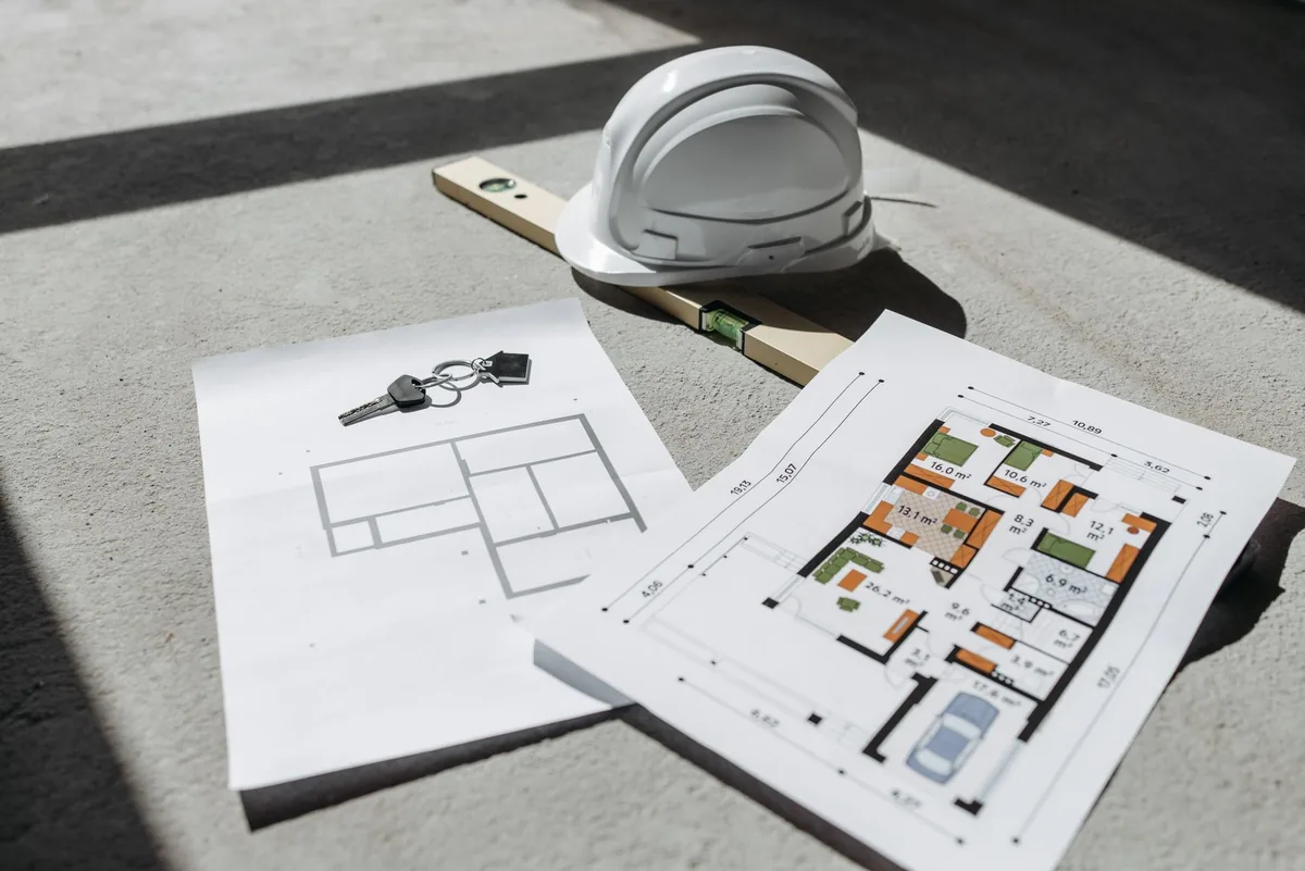 commercial construction blueprints on table